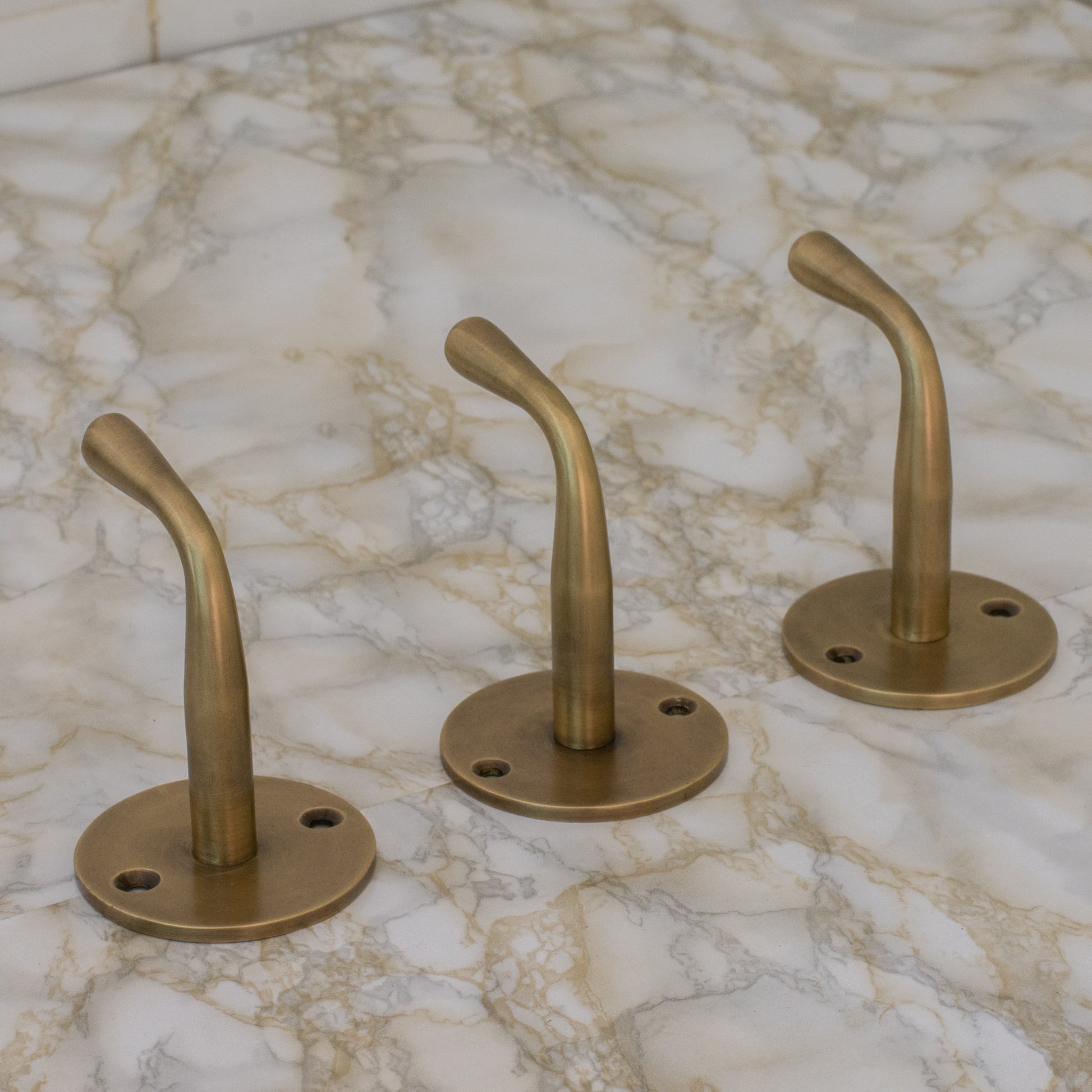 Experience authentic craftsmanship with our Vintage Brass Single Hook. Crafted from heavy-duty solid brass for timeless durability and classic style.