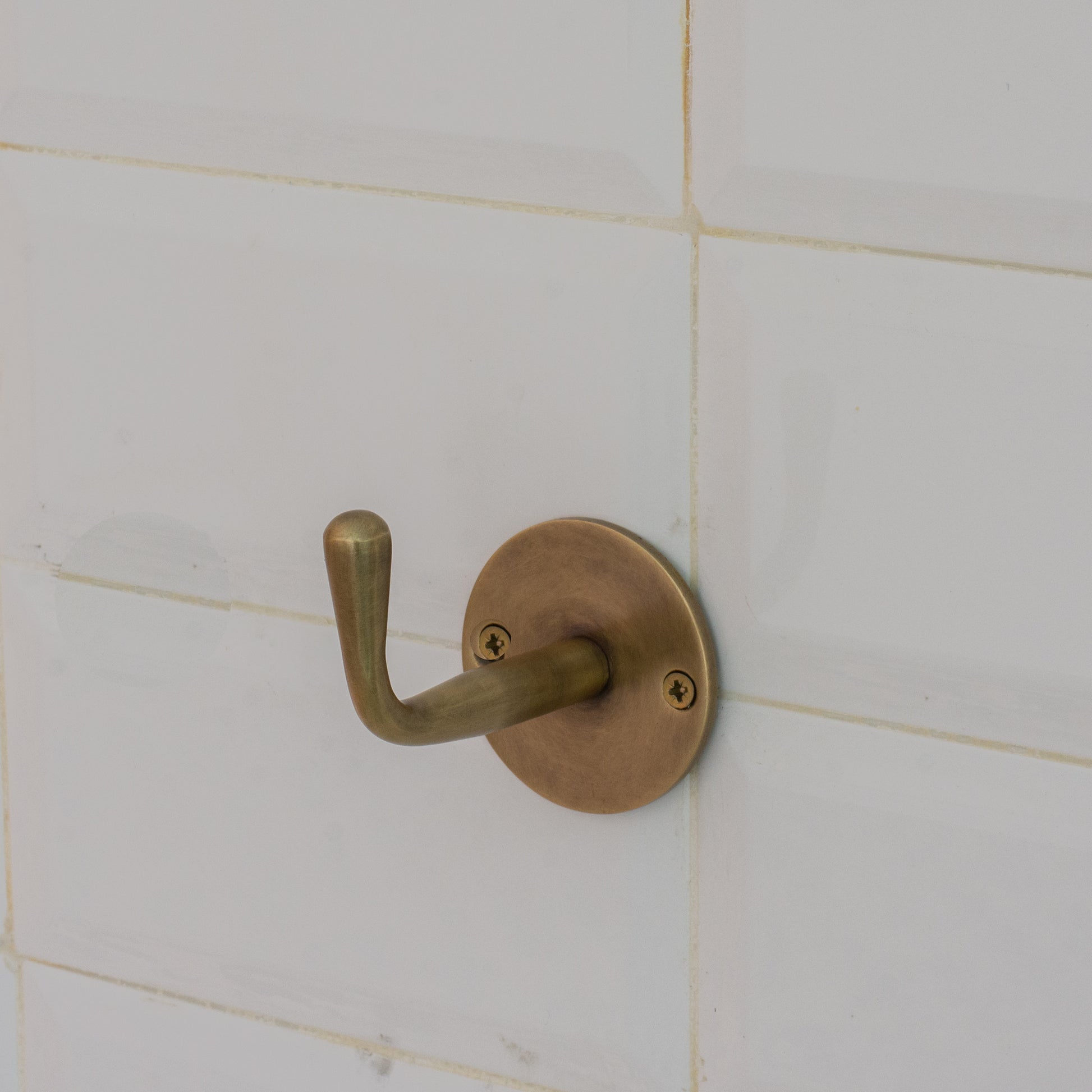 Experience authentic craftsmanship with our Vintage Brass Single Hook. Crafted from heavy-duty solid brass for timeless durability and classic style.