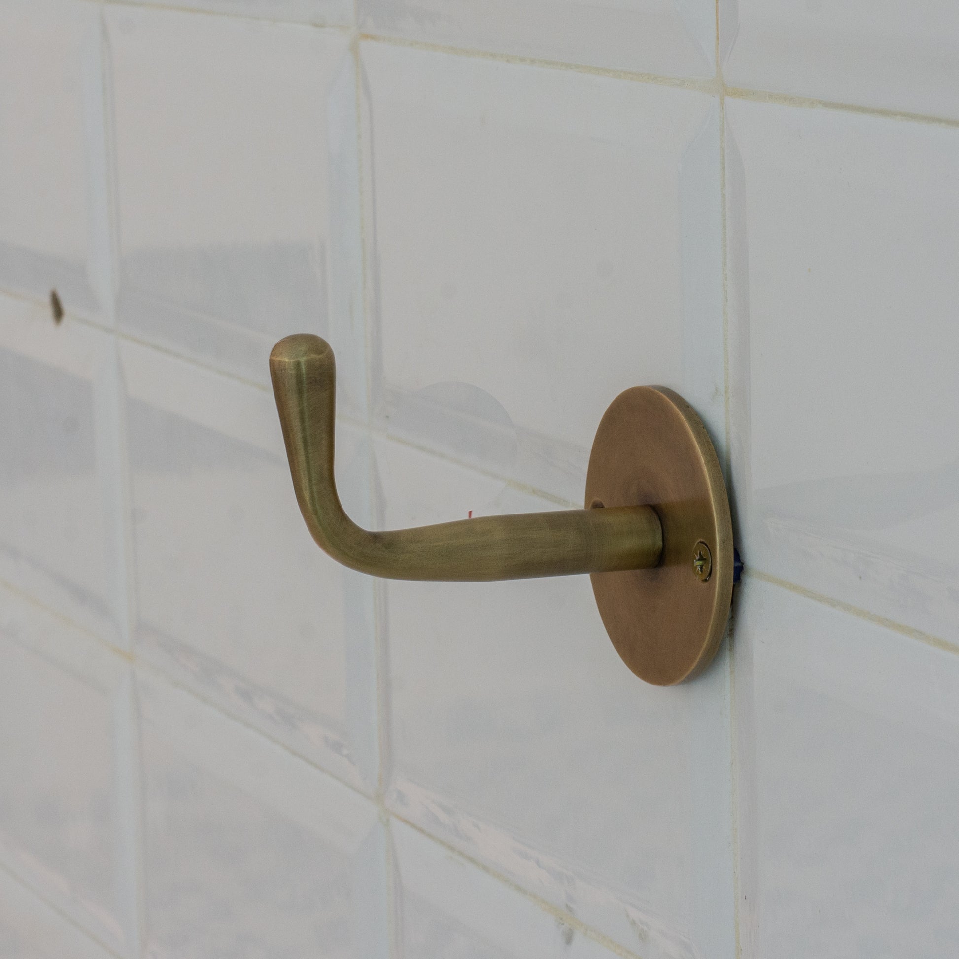Experience authentic craftsmanship with our Vintage Brass Single Hook. Crafted from heavy-duty solid brass for timeless durability and classic style.
