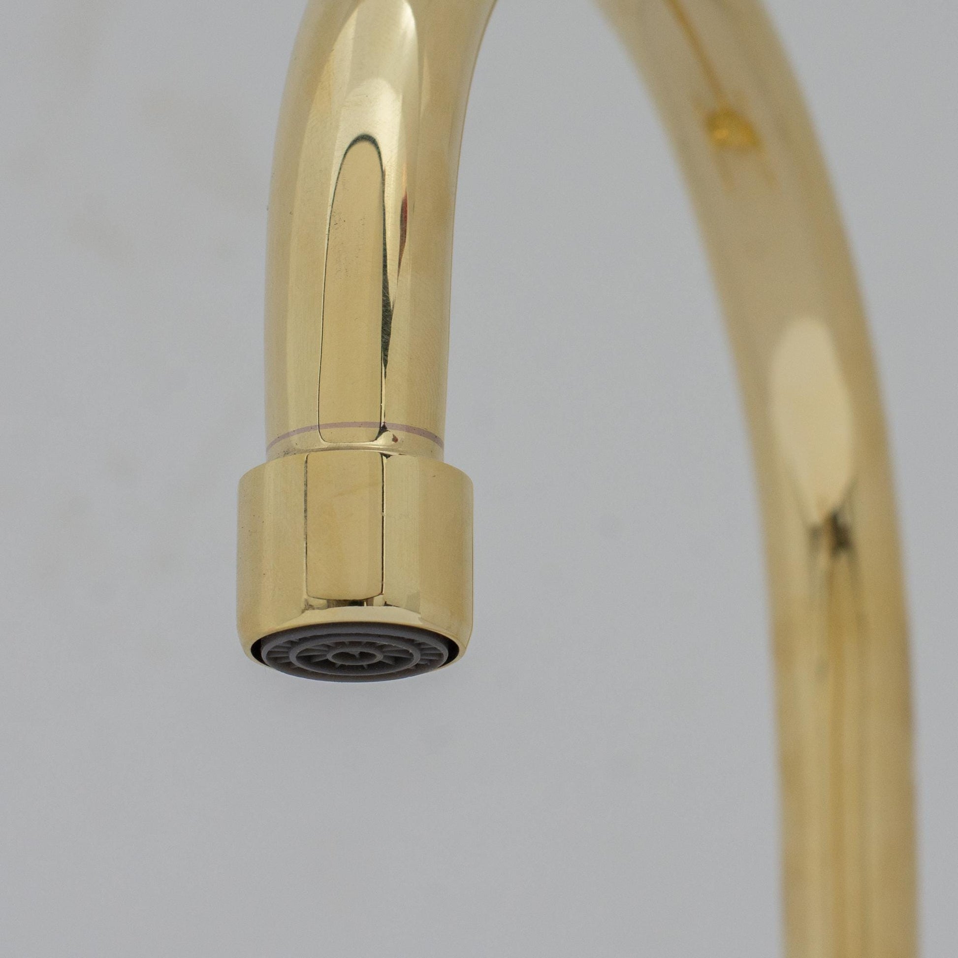 Experience refined craftsmanship and lasting quality with Unlacquered Brass Compact Single Hole Faucet that will develop natural patina over time.