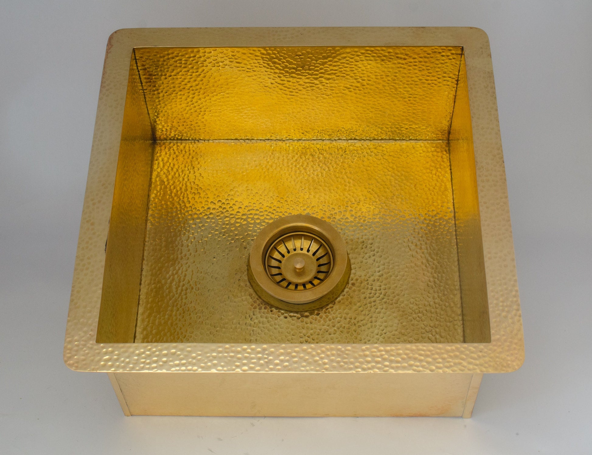 Experience authentic craftsmanship With Insideast Solid Brass Undermount Hammered Kitchen Sink that develops warm patina over time.