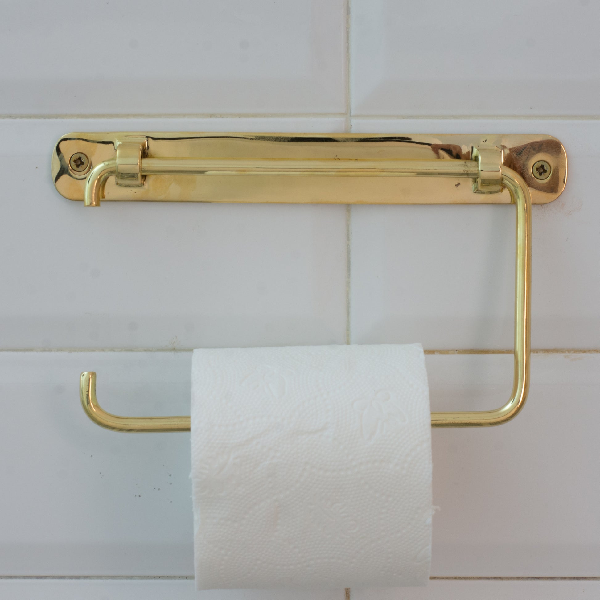 Experience authentic craftsmanship With Insideast Solid Brass TP Holder that will develop natural patina with time.