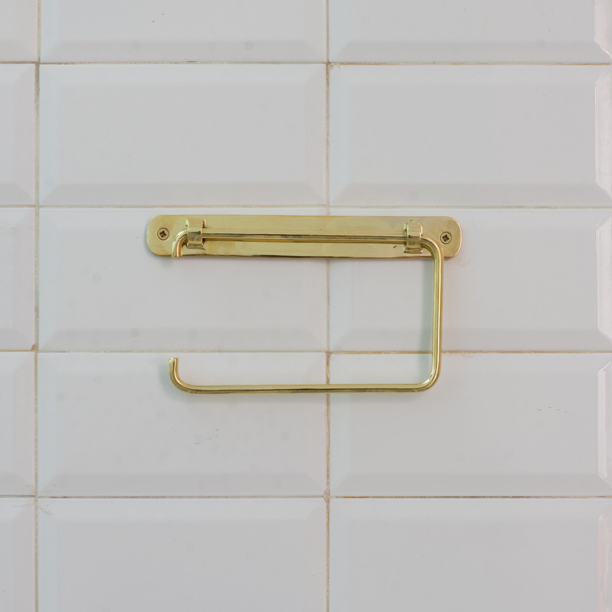 Experience authentic craftsmanship With Insideast Solid Brass TP Holder that will develop natural patina with time.