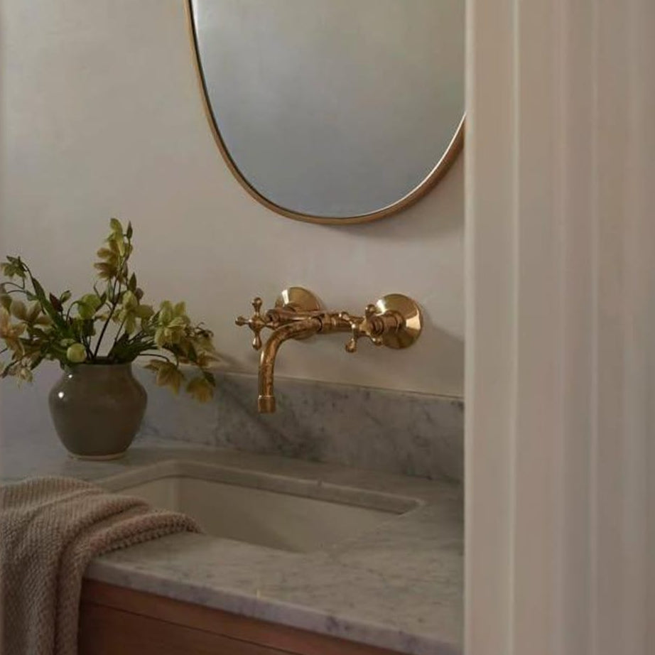Experience authentic craftsmanship With Insideast Wall-Mounted Bridge Faucet. Built from solid brass and finished in unlacquered brass that develops warm patina over time.