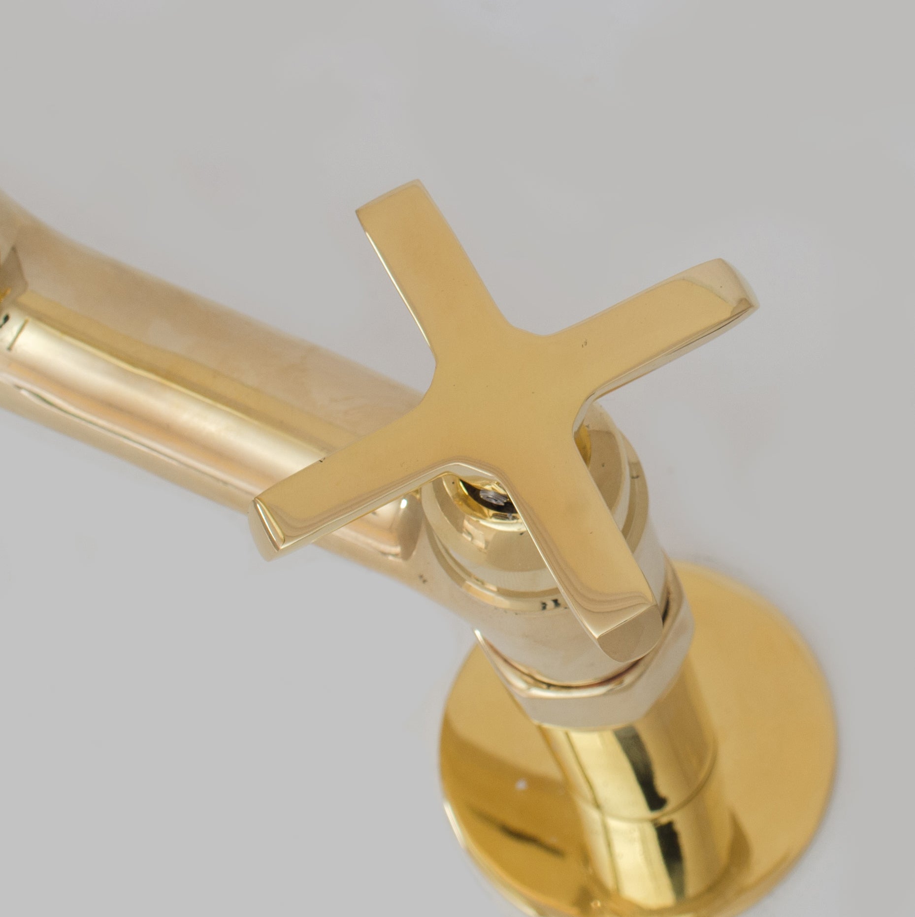 Flat simple handle detail in unlacquered brass