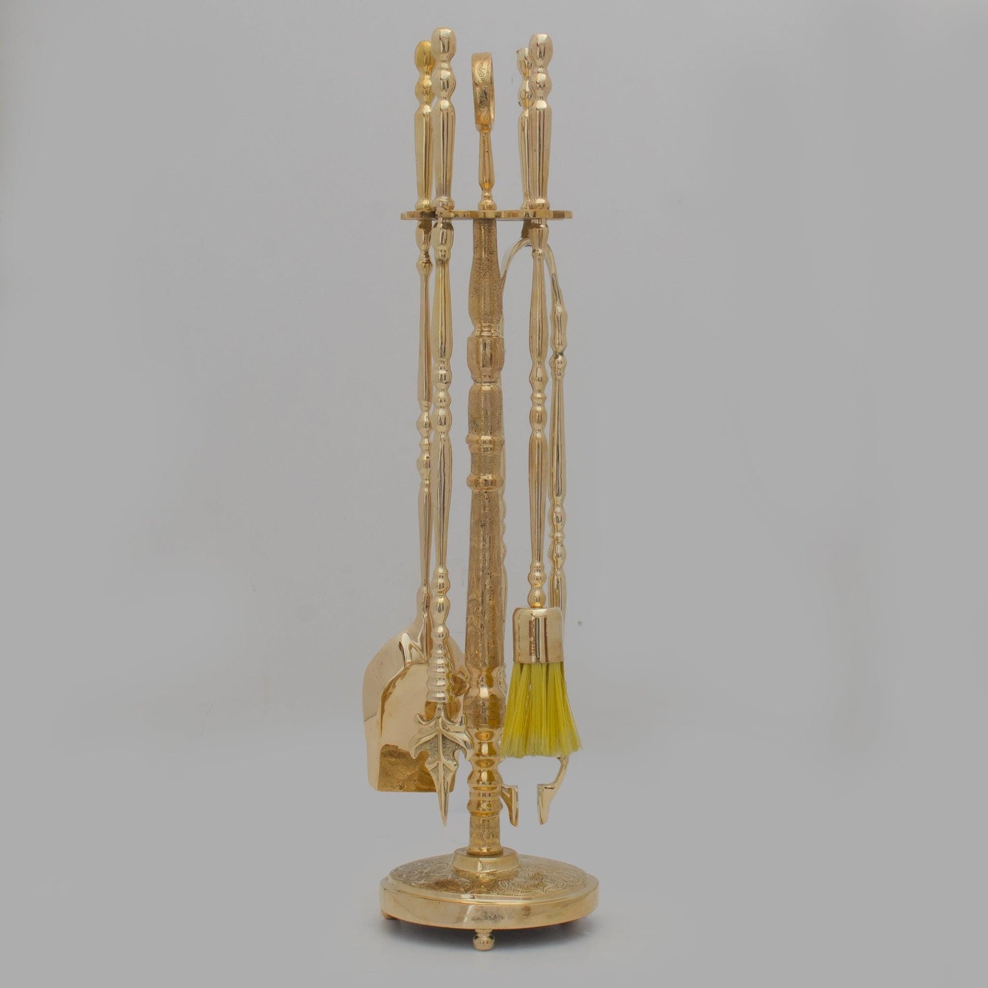 Experience refined authenticity with our Handmade Solid Brass Fireplace Tools Set that will develop natural, warm patina over time.