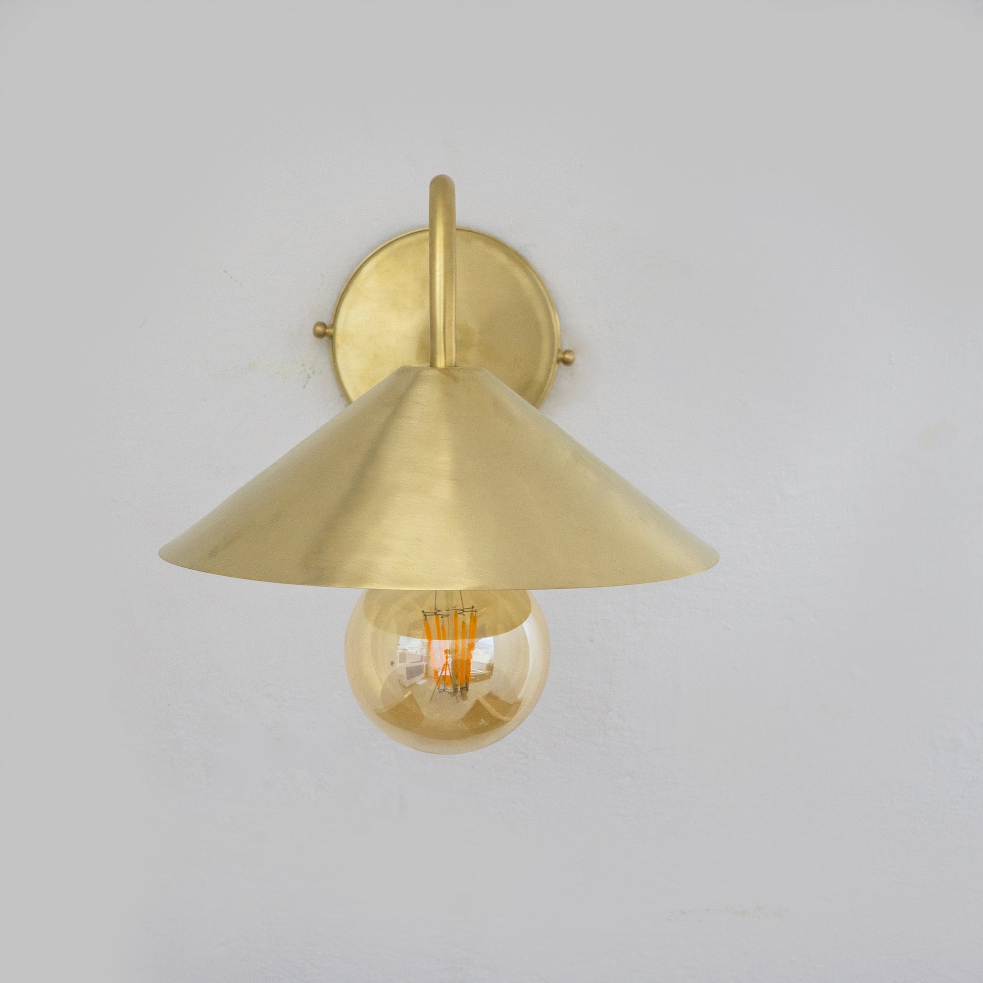 Experience authentic craftsmanship With our Solid Brass Gooseneck Cone Shade Sconce Light that will develop natural patina with time.