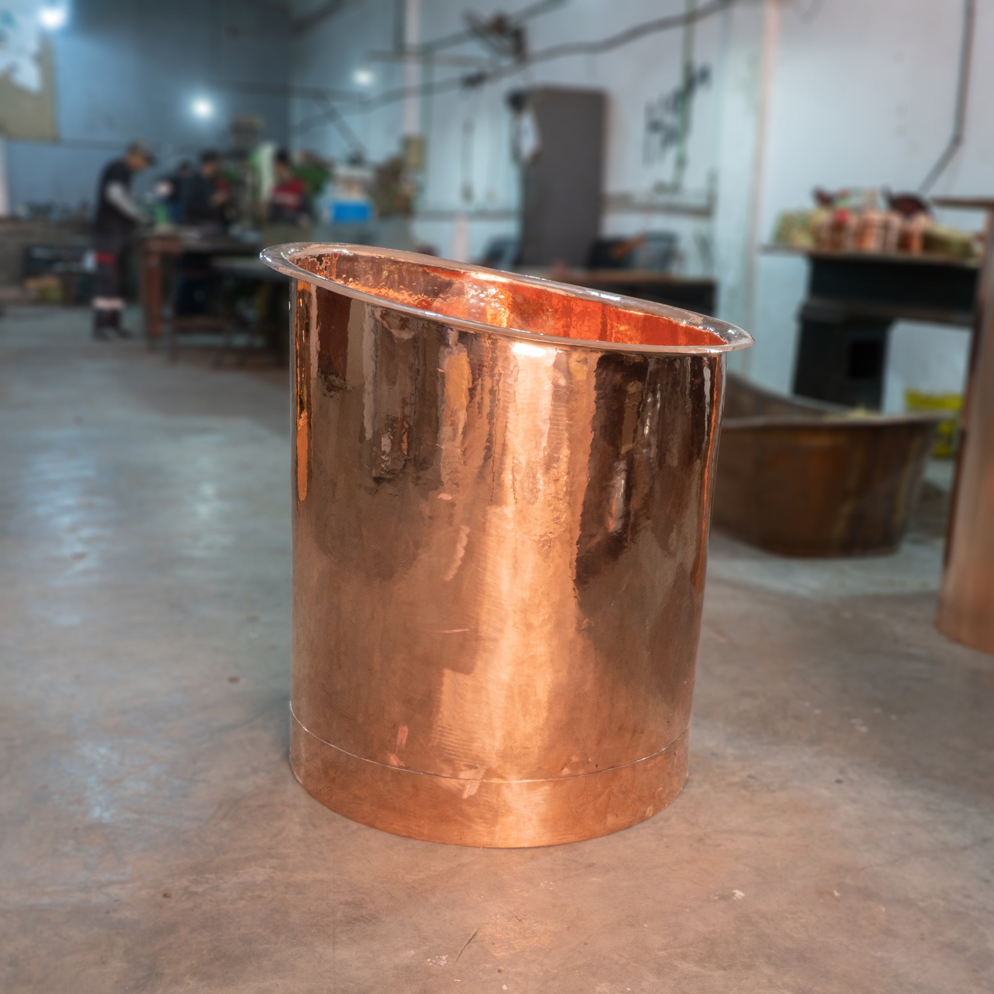 Hand-hammered copper cold plunge tub, slanted rim, athletic recovery soak