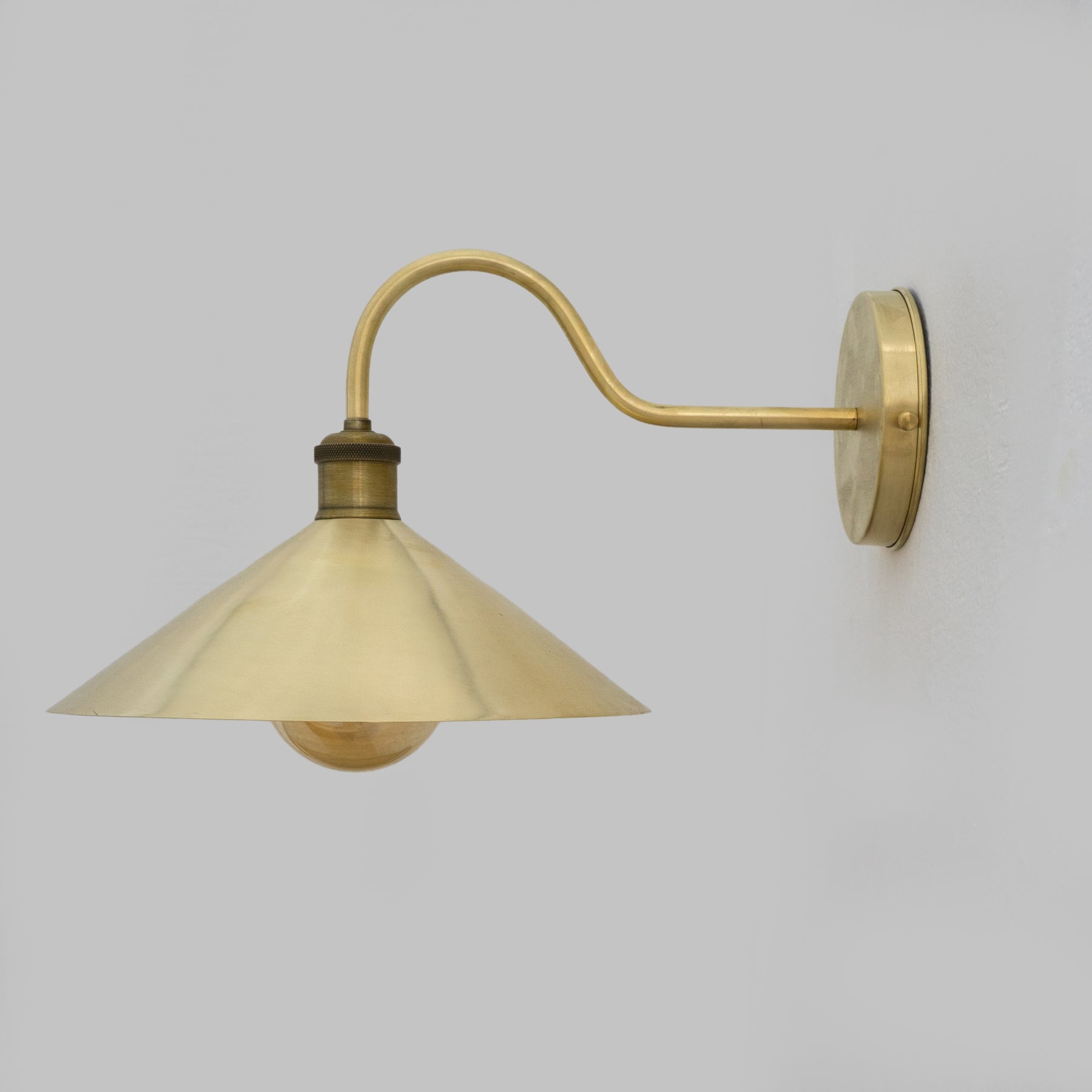 Brushed Brass Hallway Sconce Installed in Hallway