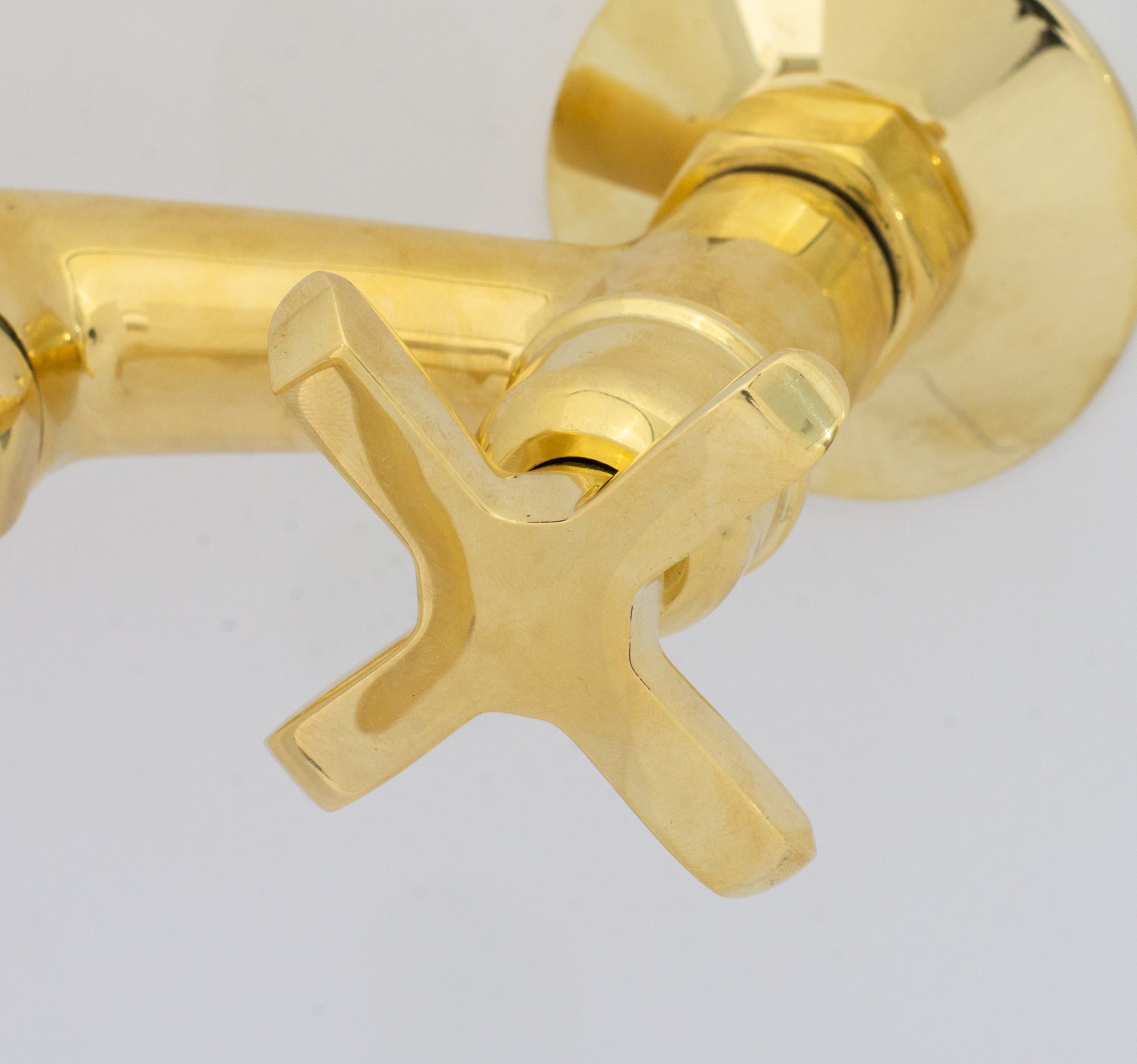Experience authentic craftsmanship With Insideast Wall-Mounted Bridge Faucet. Built from solid brass and finished in unlacquered brass that develops warm patina over time.