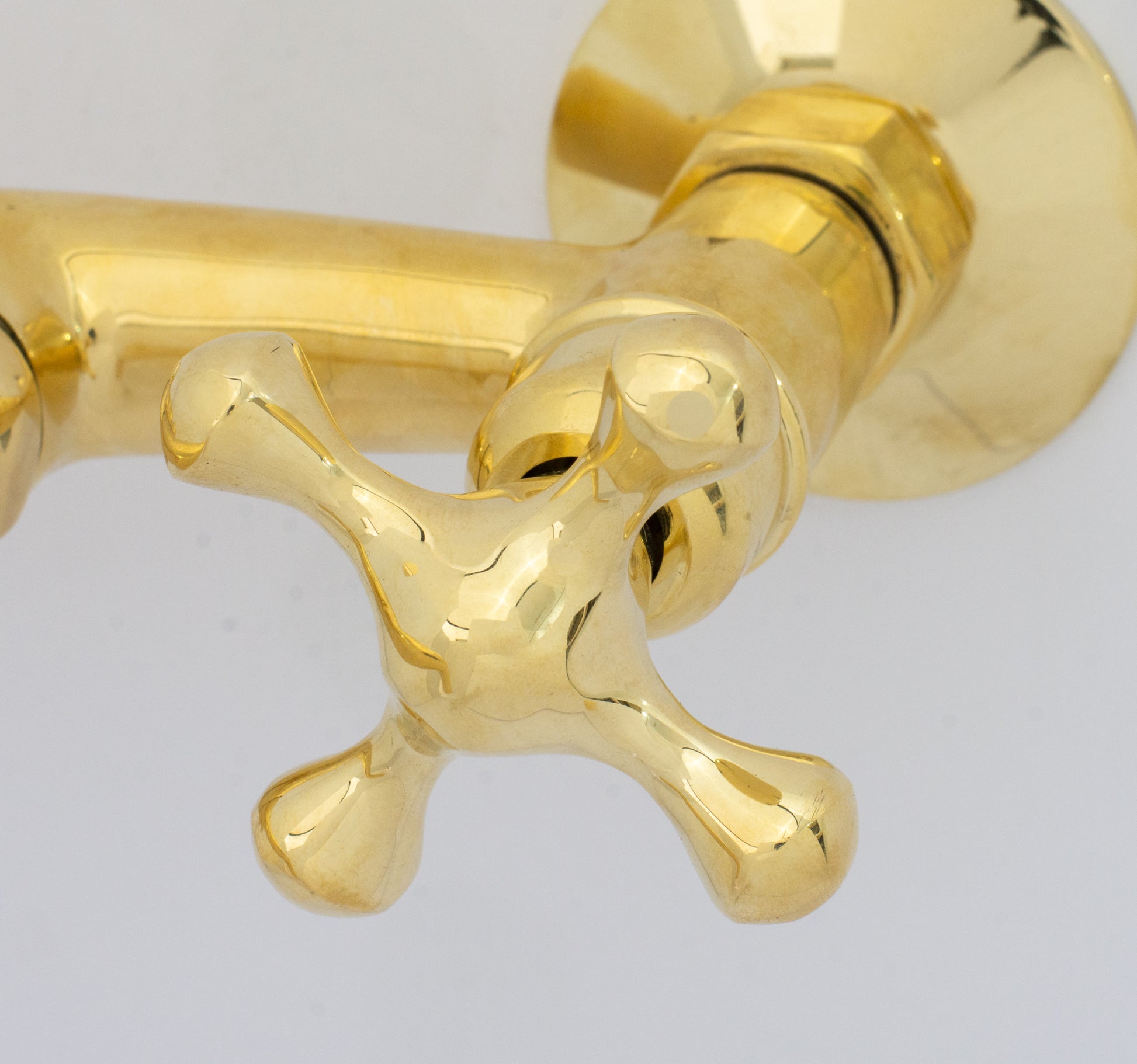 Experience authentic craftsmanship With Insideast Wall-Mounted Bridge Faucet. Built from solid brass and finished in unlacquered brass that develops warm patina over time.
