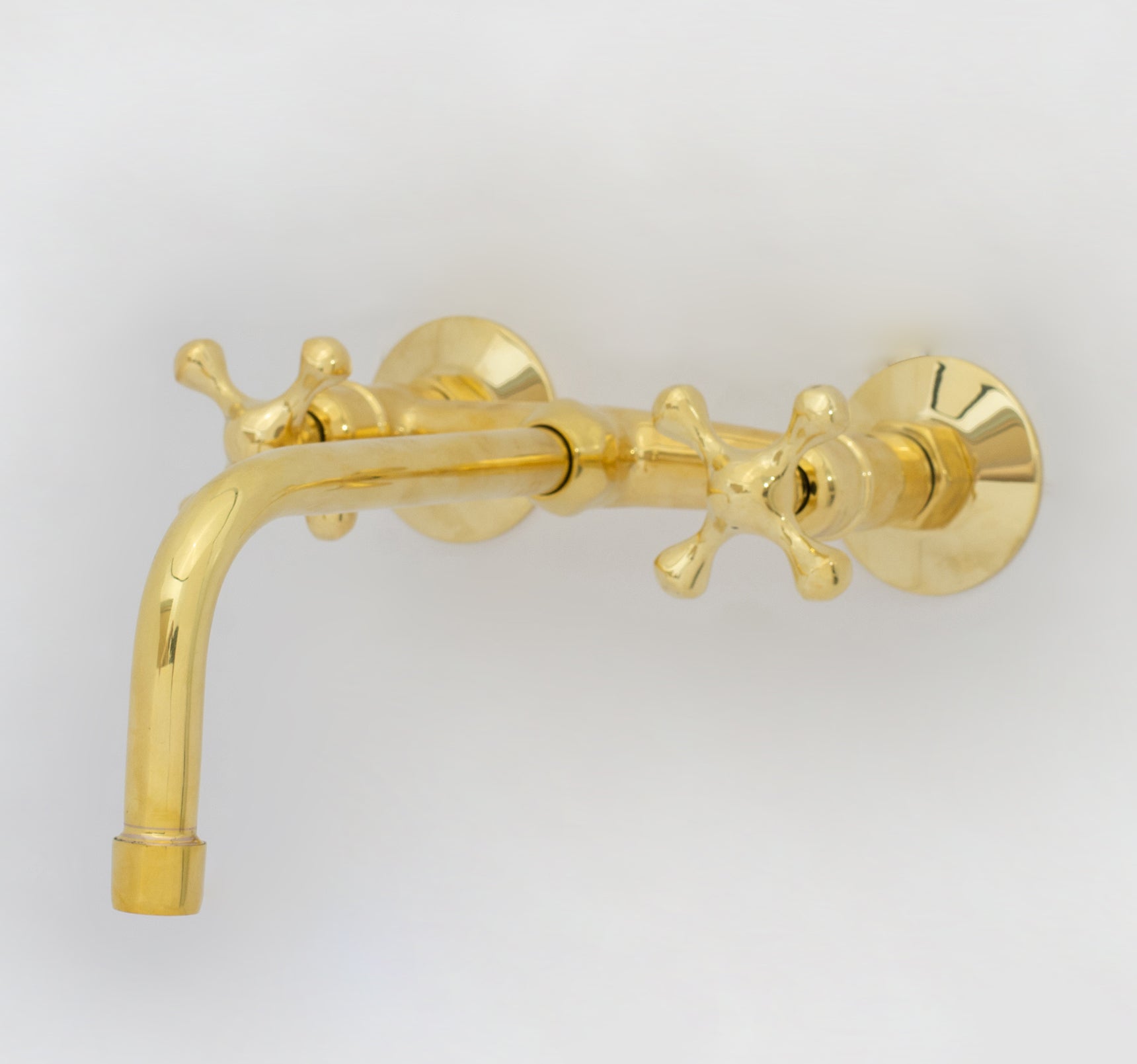 Unlacquered brass wall mount bridge faucet