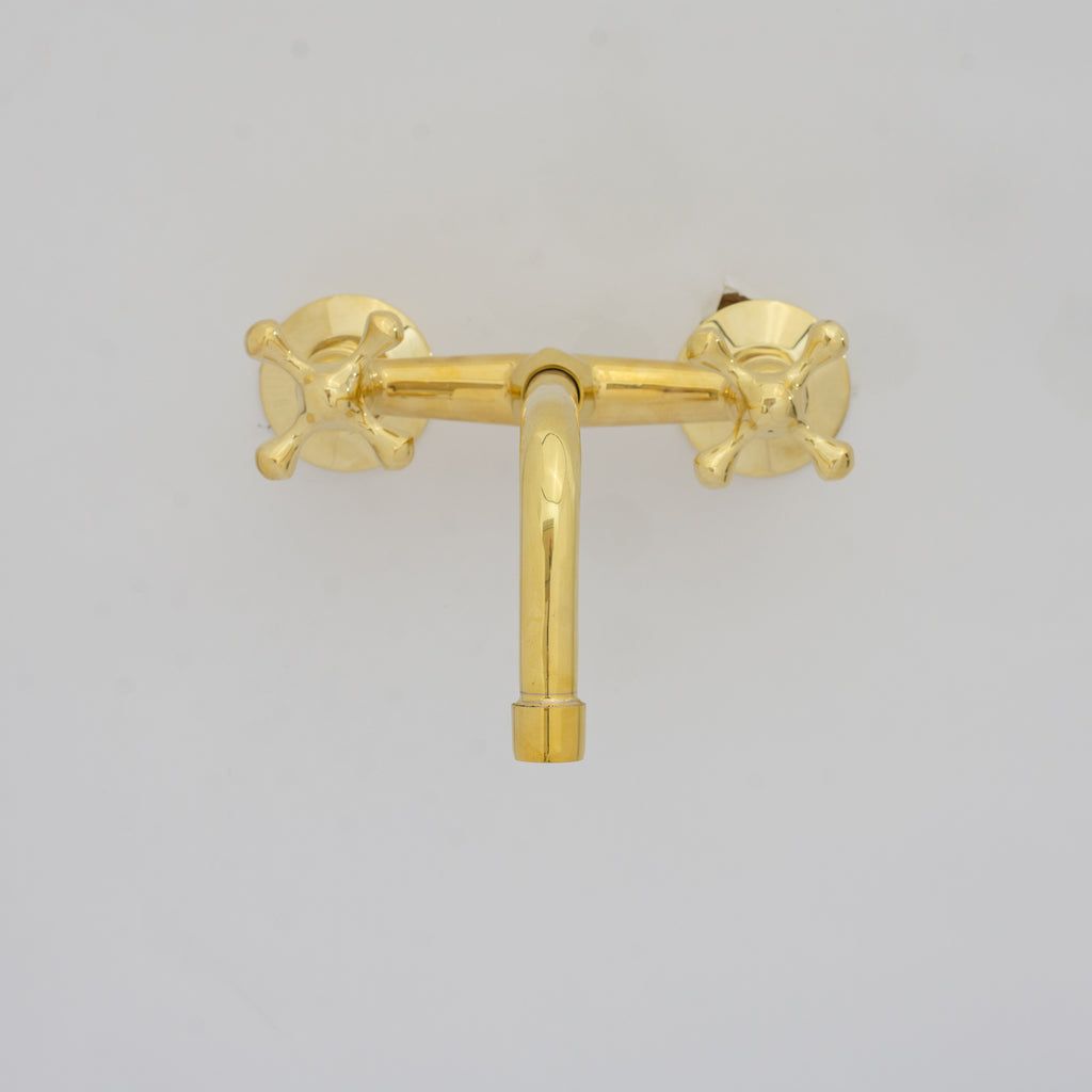 Experience authentic craftsmanship With Insideast Wall-Mounted Bridge Faucet. Built from solid brass and finished in unlacquered brass that develops warm patina over time.