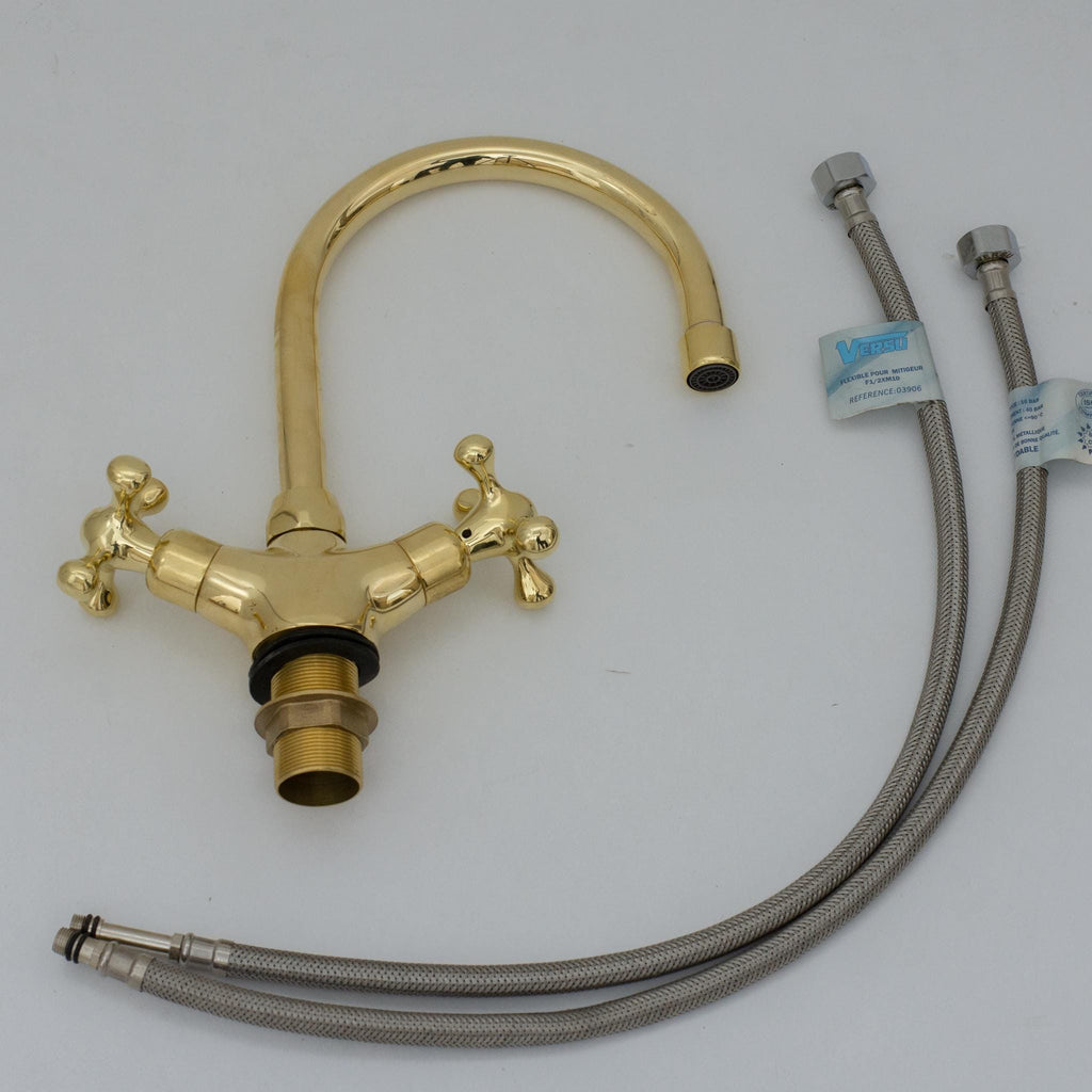 Experience refined craftsmanship and lasting quality with Unlacquered Brass Compact Single Hole Faucet that will develop natural patina over time.