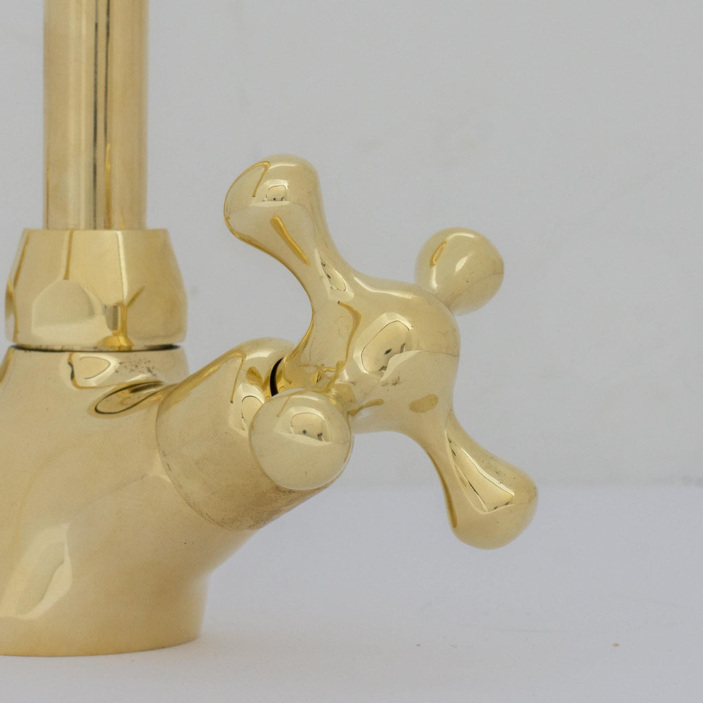 Experience refined craftsmanship and lasting quality with Unlacquered Brass Compact Single Hole Faucet that will develop natural patina over time.