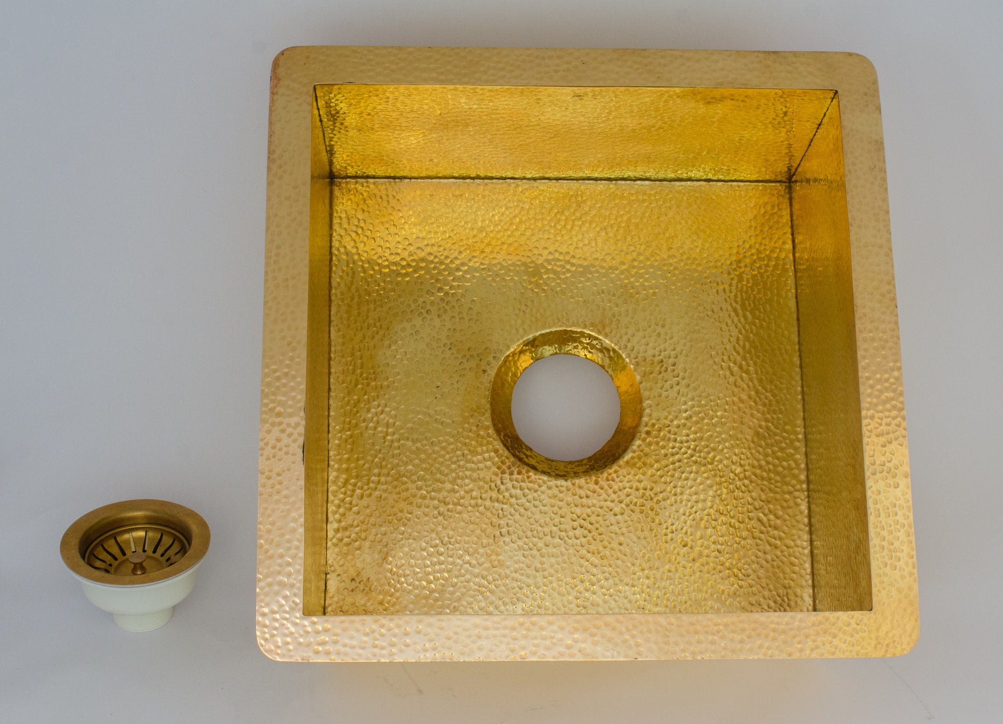 Experience authentic craftsmanship With Insideast Solid Brass Undermount Hammered Kitchen Sink that develops warm patina over time.