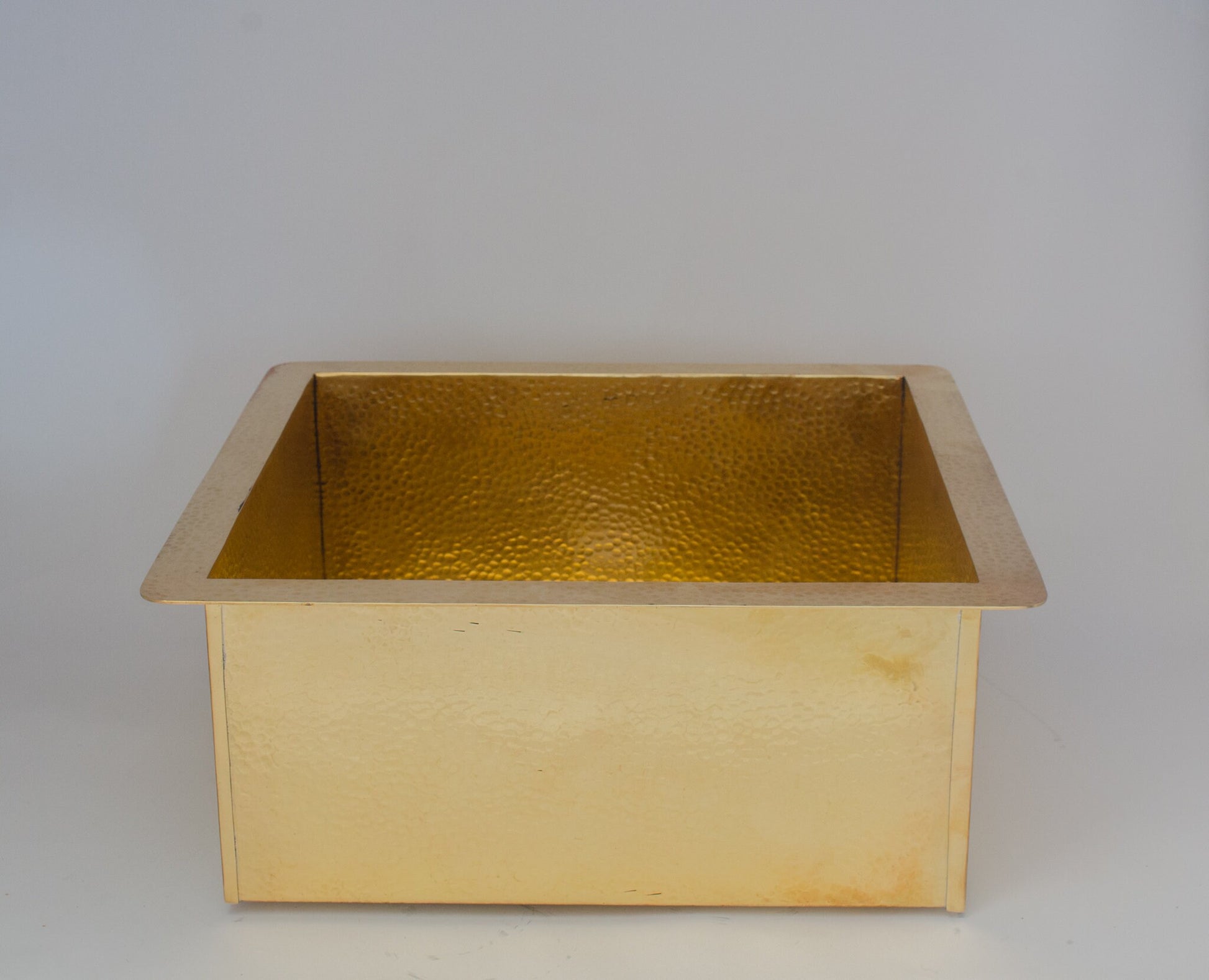 Experience authentic craftsmanship With Insideast Solid Brass Undermount Hammered Kitchen Sink that develops warm patina over time.