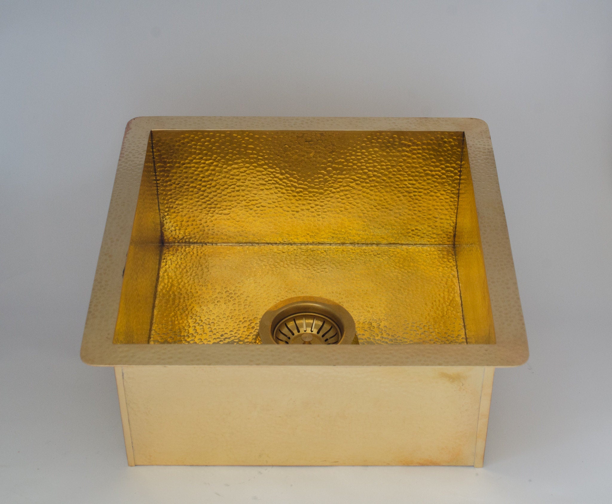 Experience authentic craftsmanship With Insideast Solid Brass Undermount Hammered Kitchen Sink that develops warm patina over time.