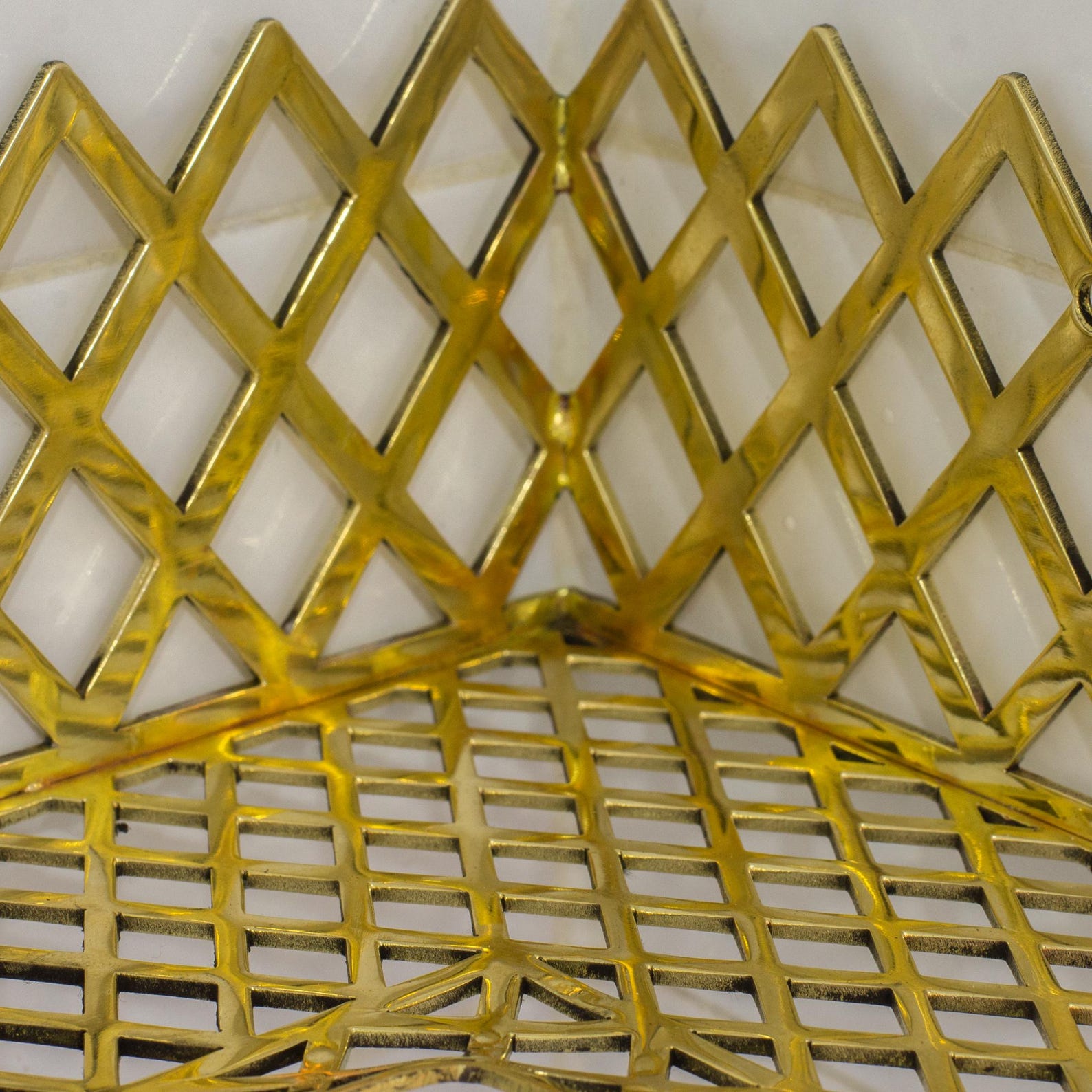 Experience authentic craftsmanship With Insideast Solid Brass Double Grid Corner Shelf that will develop natural patina with time.