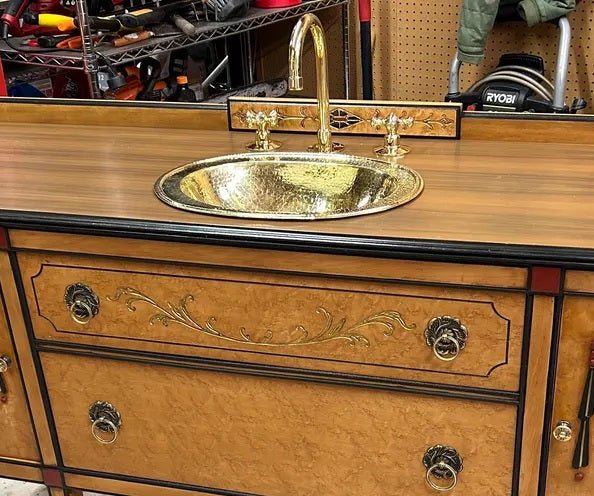 Hammered oval drop-in brass sink in aged antique brass finish