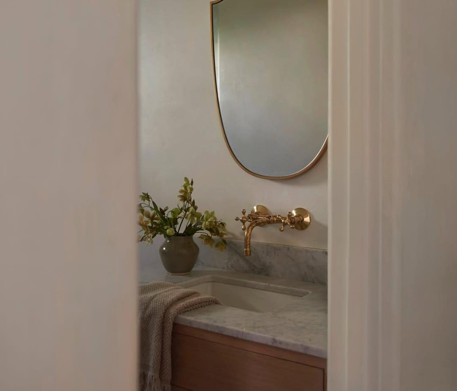 Experience authentic craftsmanship With Insideast Wall-Mounted Bridge Faucet. Built from solid brass and finished in unlacquered brass that develops warm patina over time.
