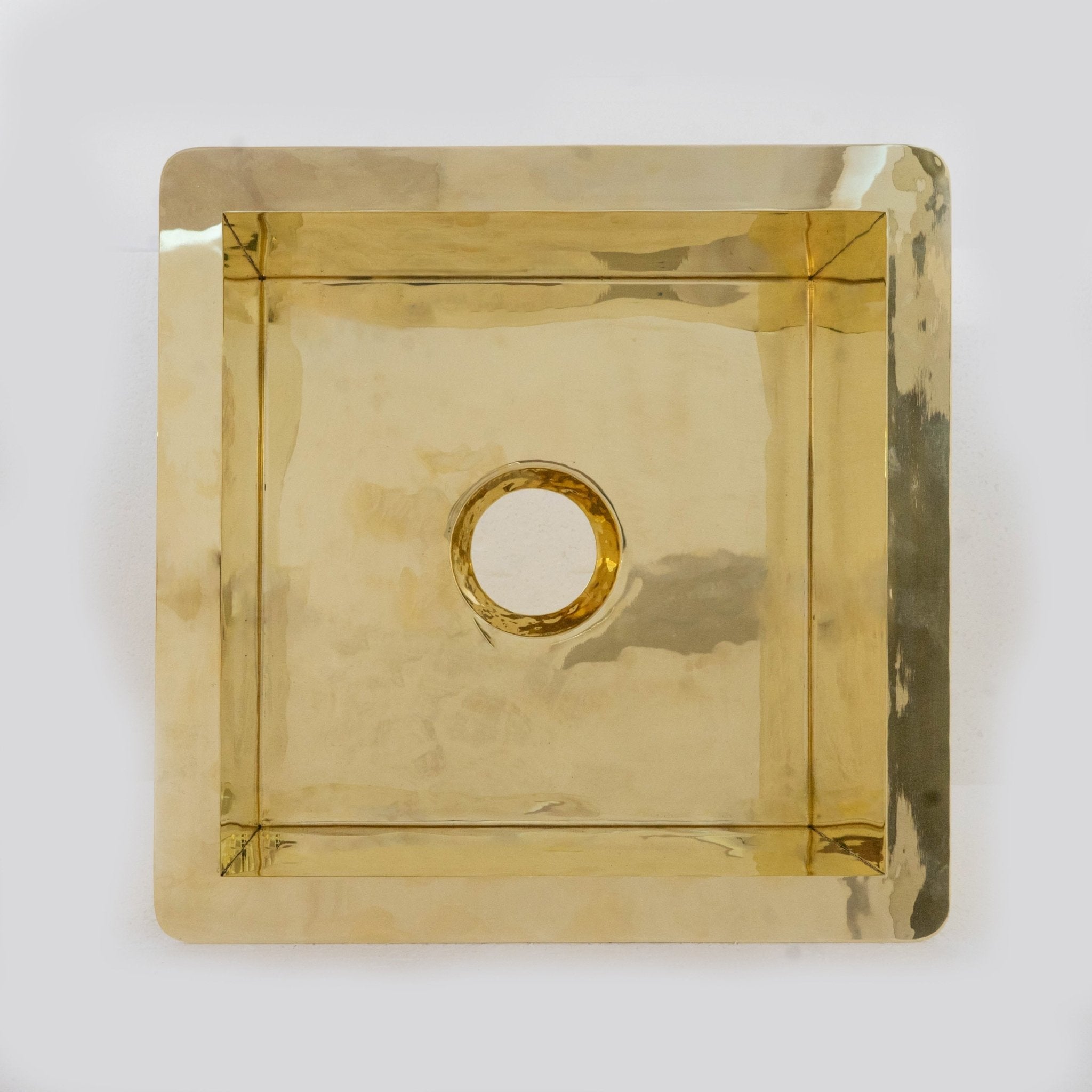 Polished brass sink overhead view — smooth surface and elegant finish