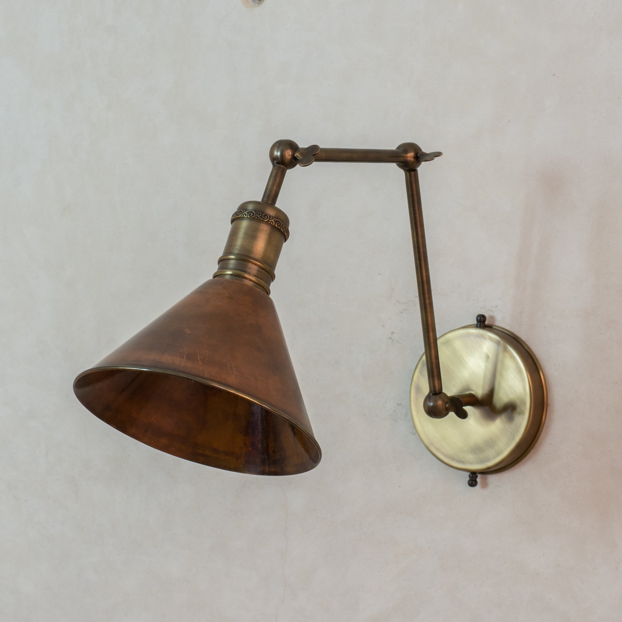 Oxidized copper swing arm wall sconce, three-point adjustable, Insideast