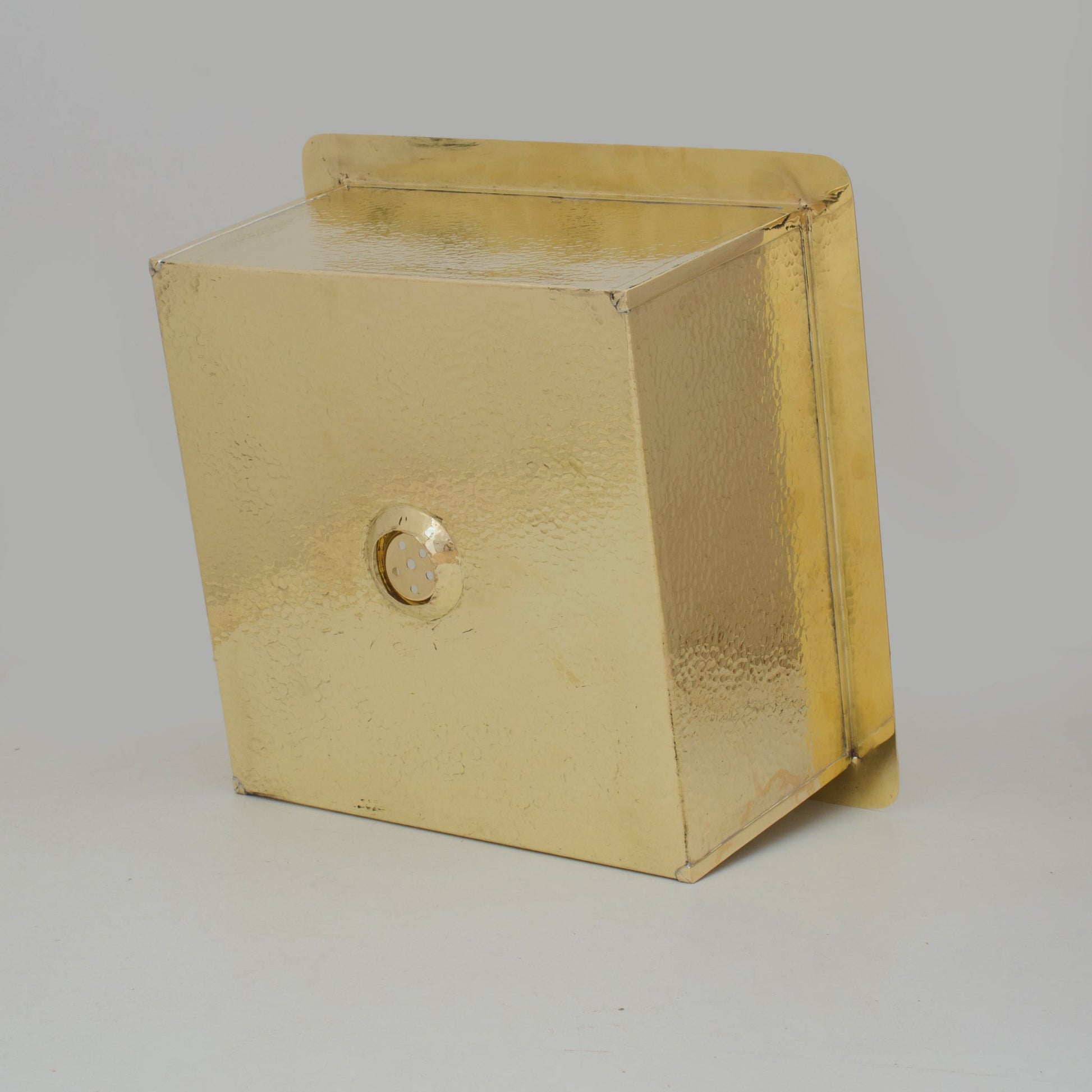 Brass sink undermount installation from below — clean lip and corner detail