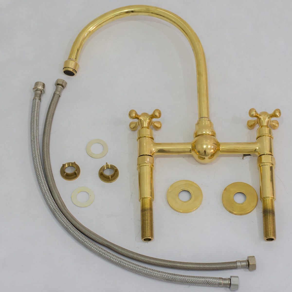 Full package of the unlacquered brass bridge kitchen faucet