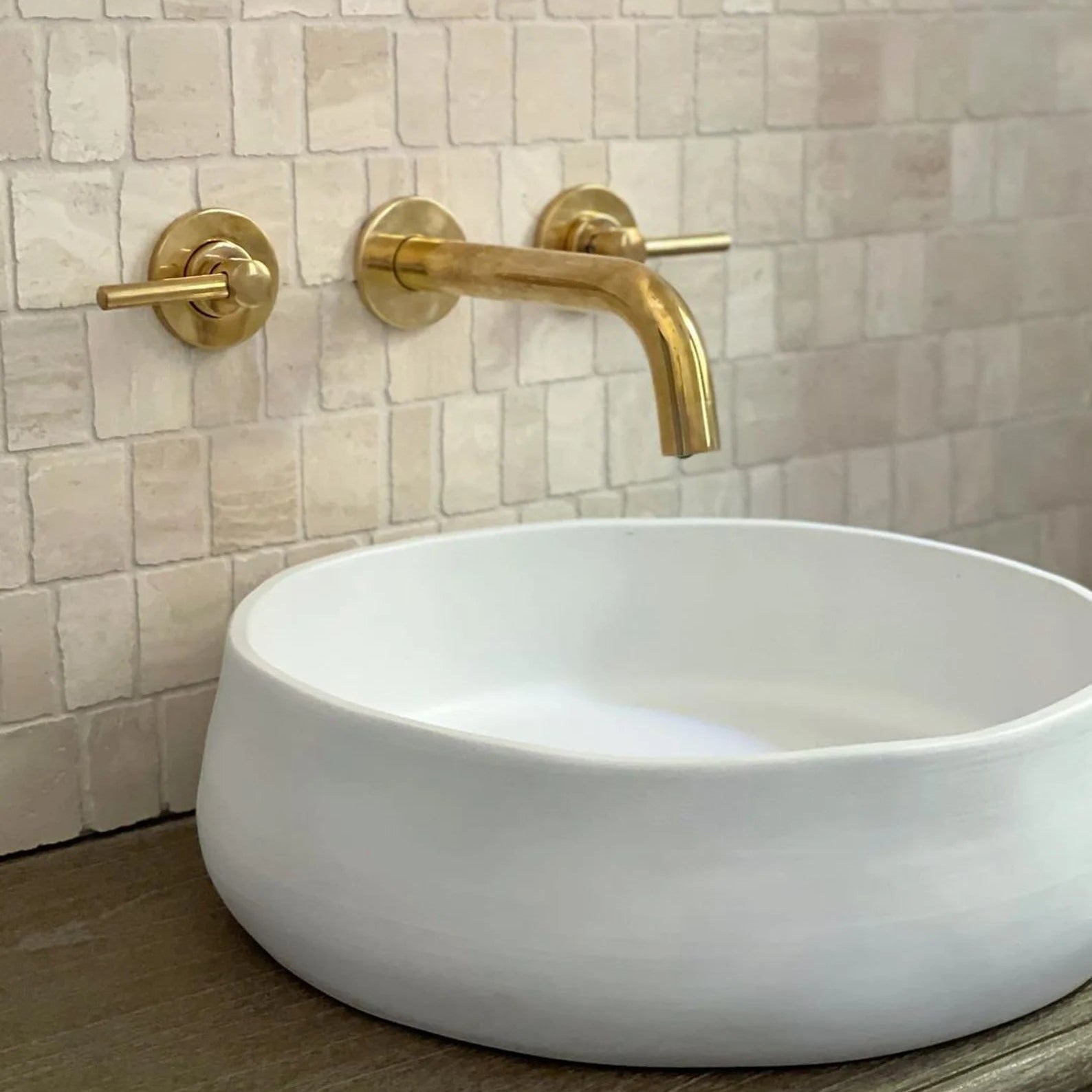 Unlacquered solid brass wall-mounted vessel sink faucet
