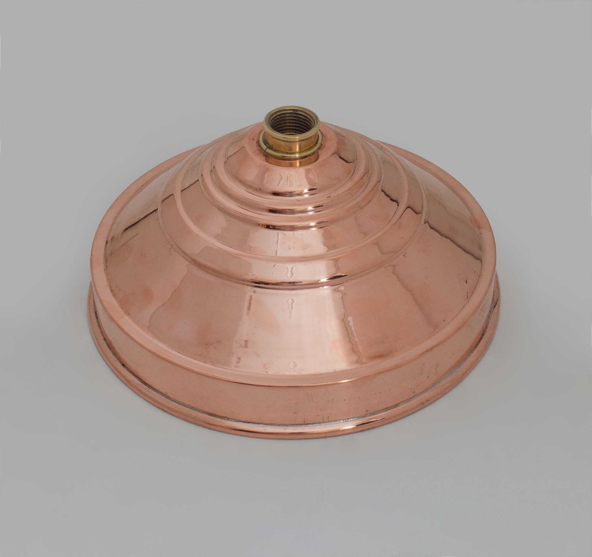 Copper rain shower head connection and rim detail