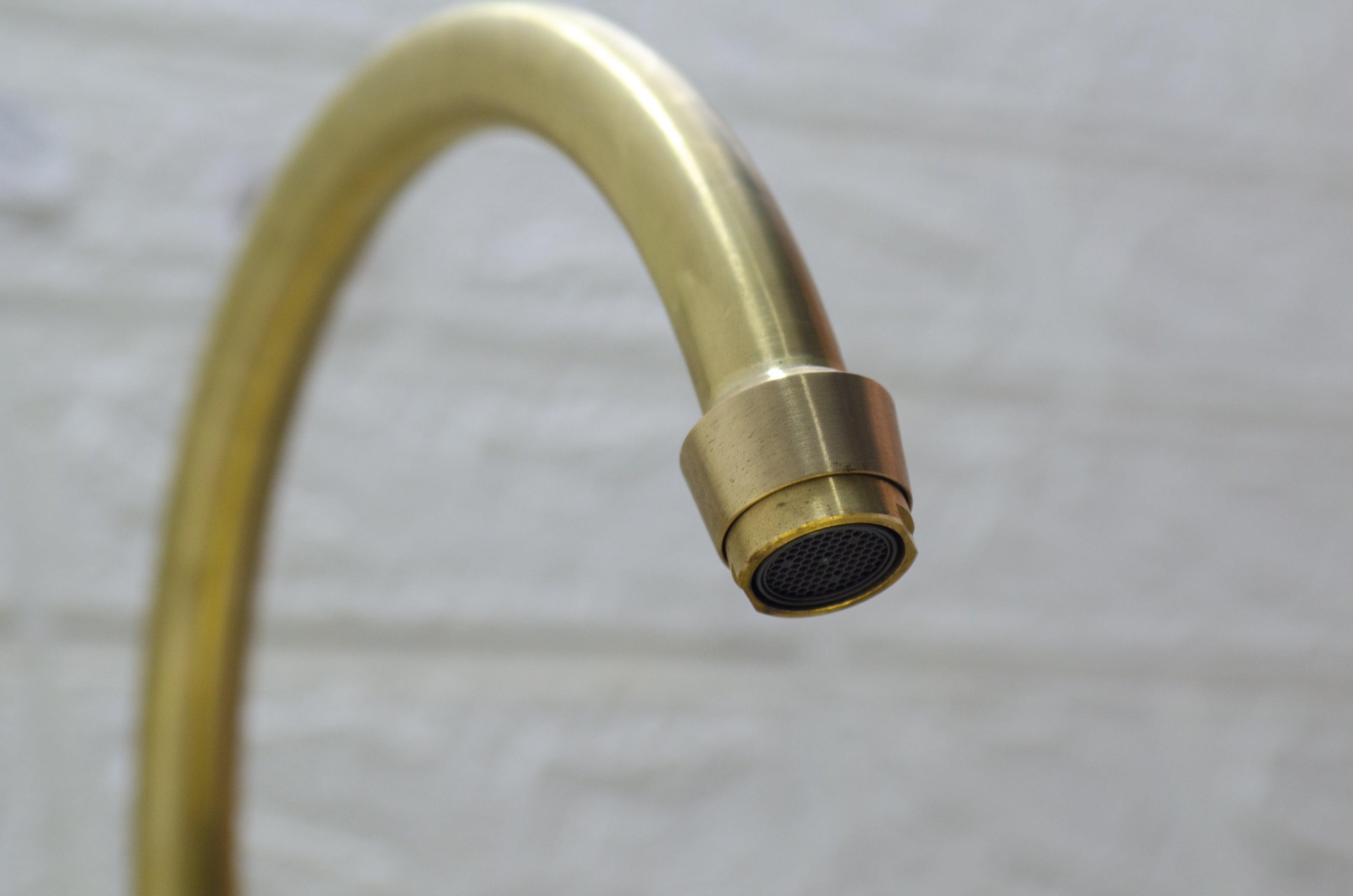 unlacquered brass bridge faucet