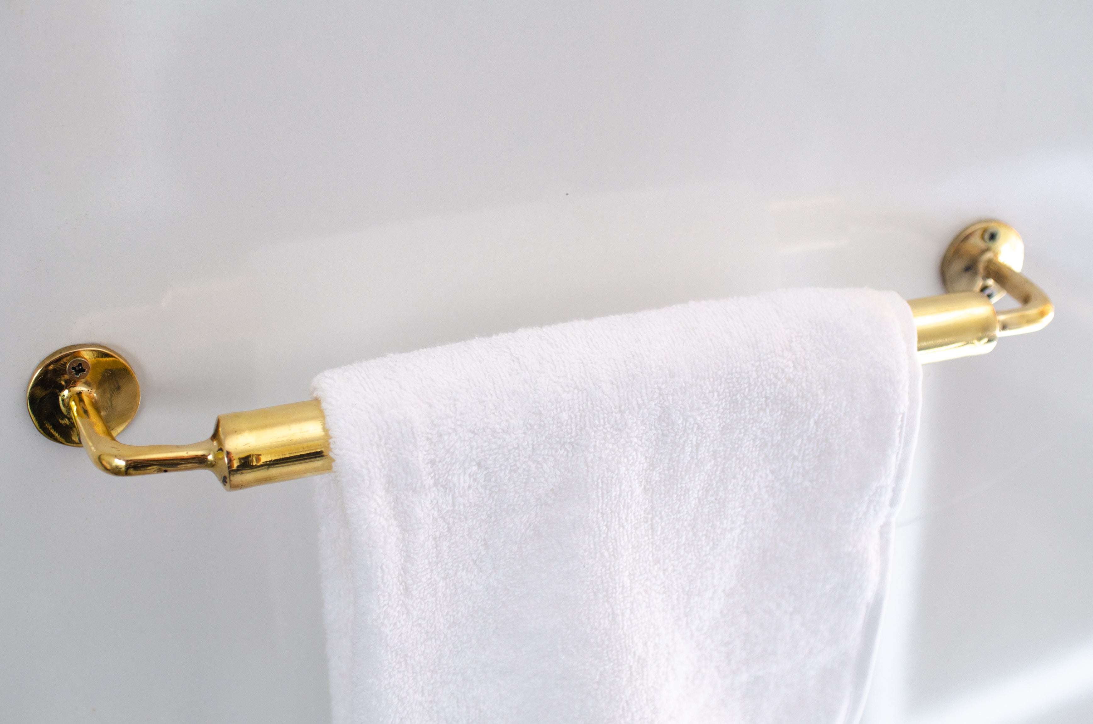 https://www.insideast.com/cdn/shop/products/unlacquered-brass-towel-rail-bathroom-towel-holder-995702.jpg?v=1650461758
